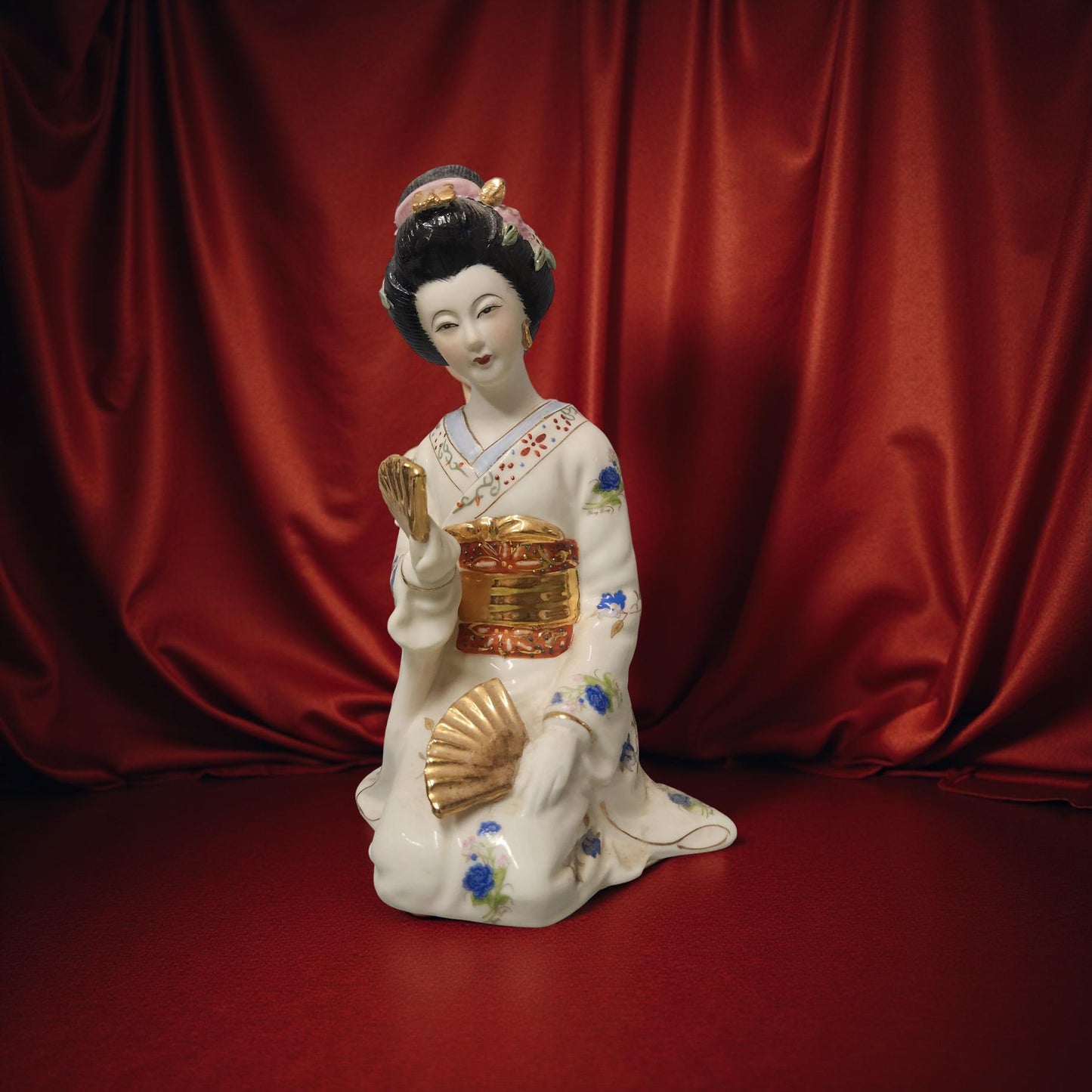 White Porcelain Geisha Figurine with Blue & Gold Floral Design