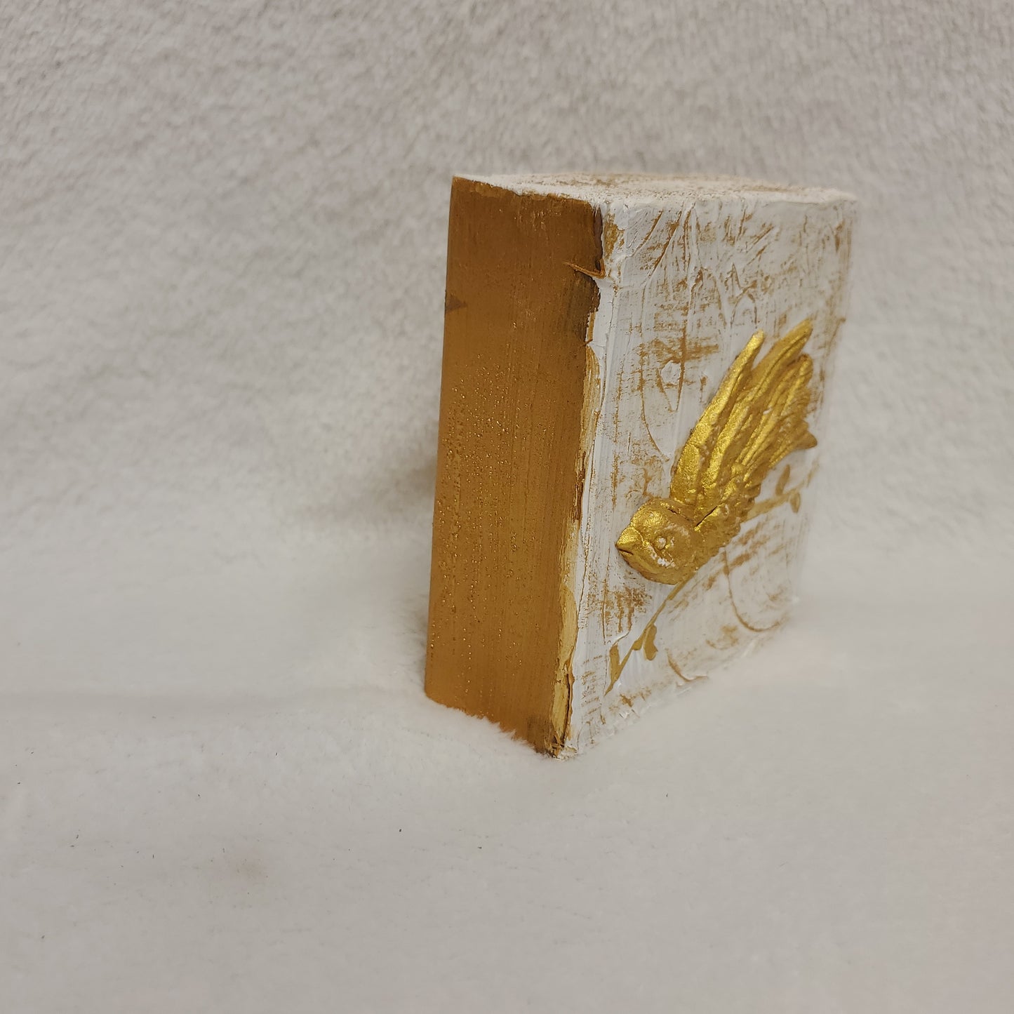Golden Bird on Wood