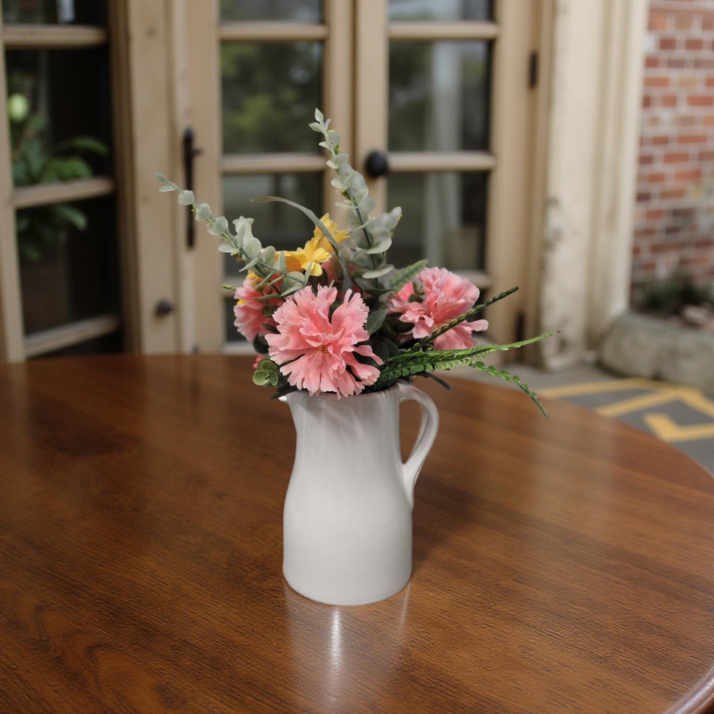 Vintage Style Milk Jug Vase with Colorful Spring Blooms