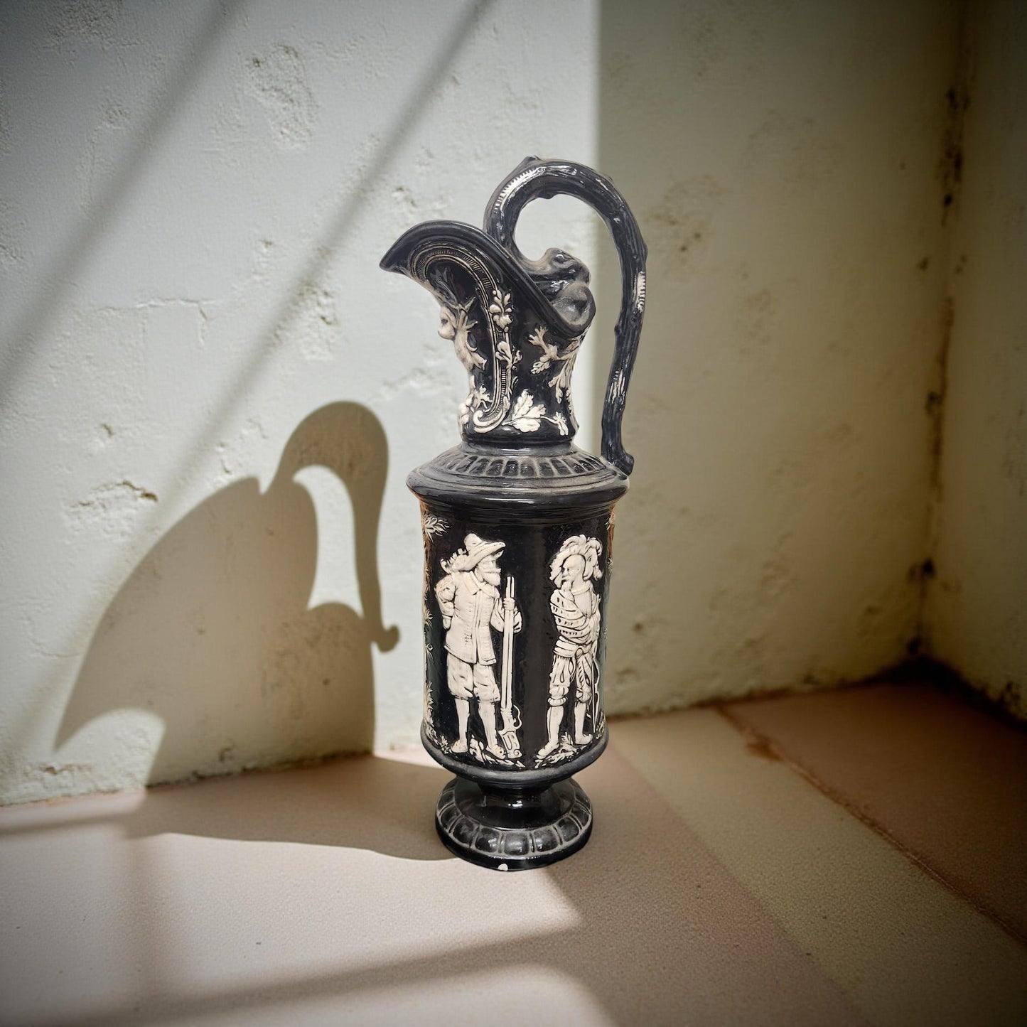 Black and White Antique Pitcher with Soldiers
