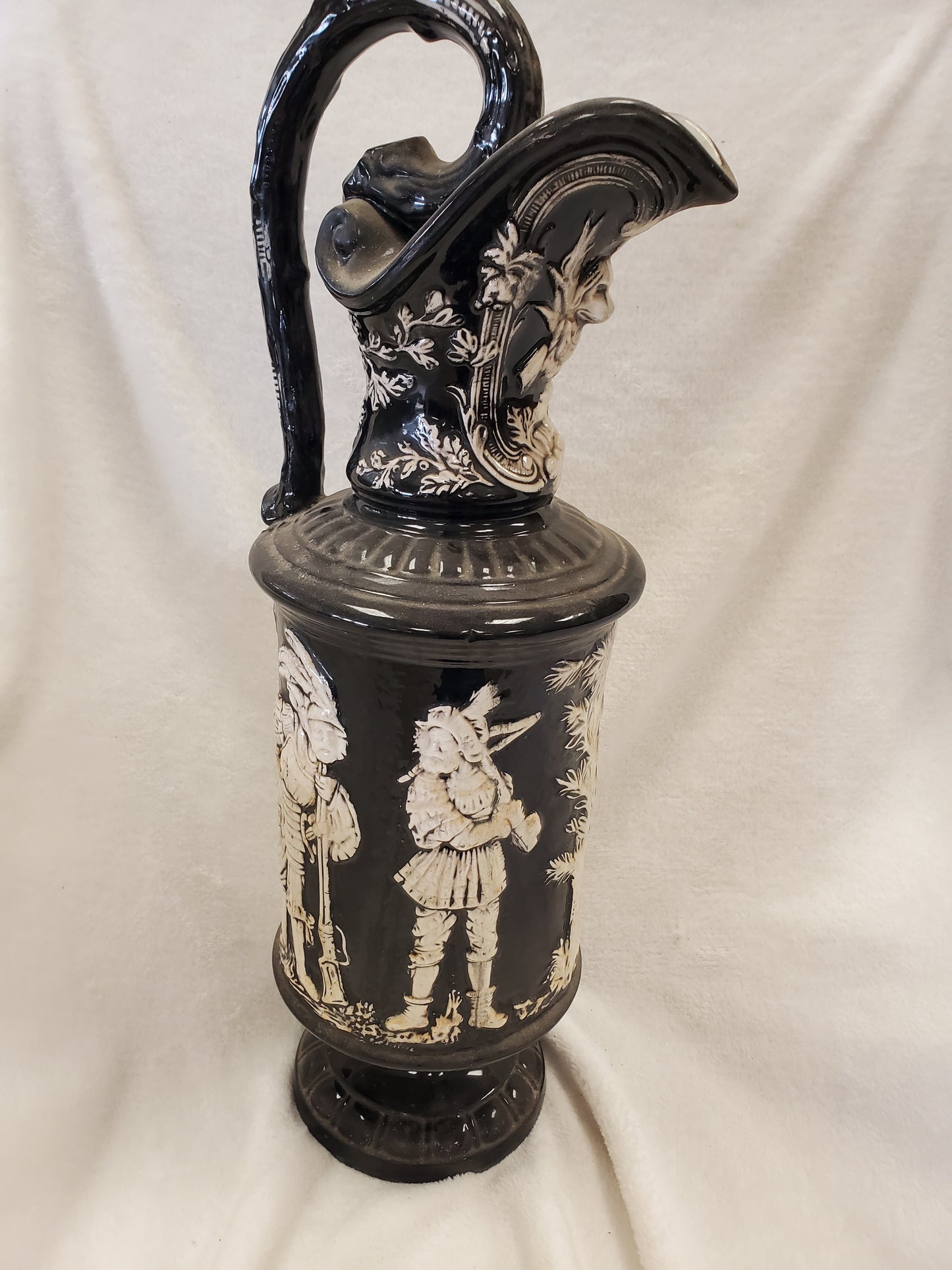 Black and White Antique Pitcher with Soldiers